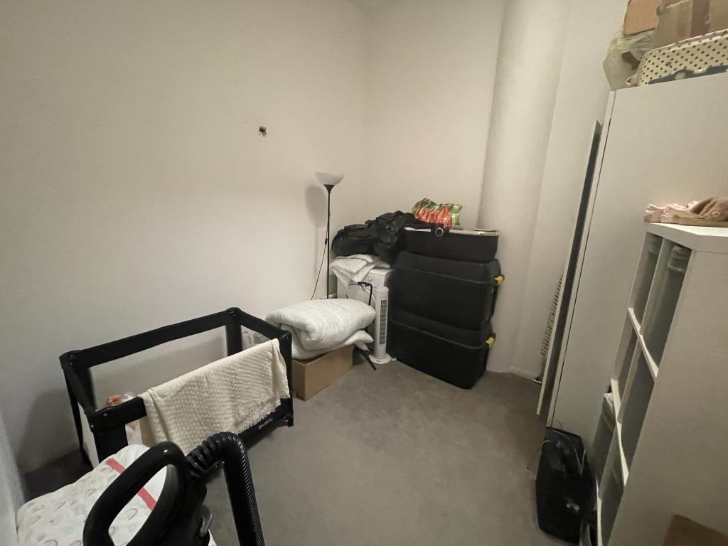 Lot: 149 - TOP FLOOR FLAT FOR INVESTMENT OR OWNER-OCCUPATION - inside image of second bedroom from hallway